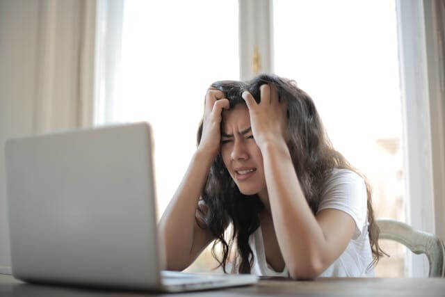 A stressed woman symbolising the German Stress Vocabulary Quiz.