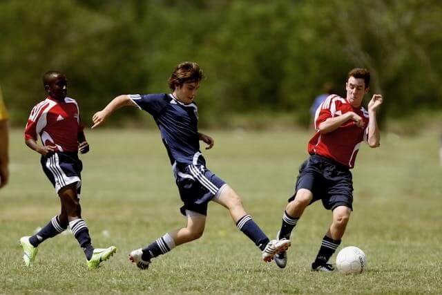 Football players in action symbolising German Short Story featuring Sports Vocabulary.