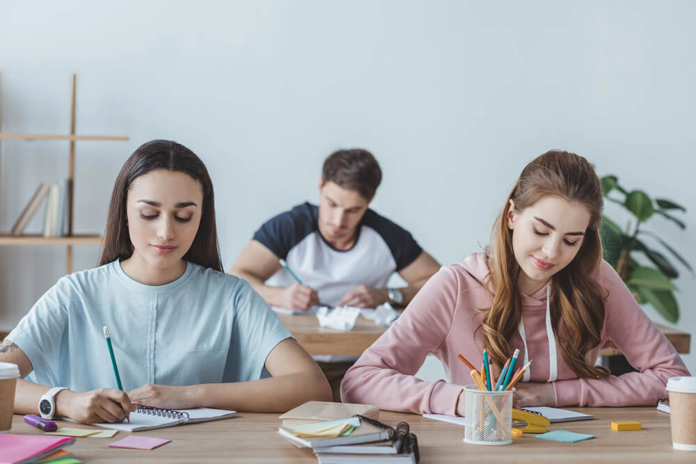 Group of students practicing German participles