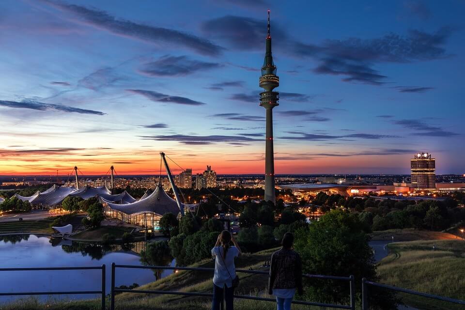 Munich skyline at sunset representing the German language such as the participles.