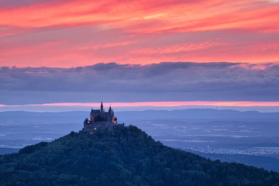 Scenic castle at sunset representing the beauty of German grammar.