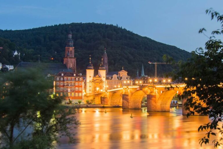 Illuminated Old Bridge in Heidelberg – learn German online in Heidelberg with personalized lessons.